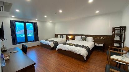 Quadruple Room with View - Bed