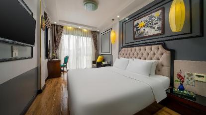 Junior Suite with City View - Bed