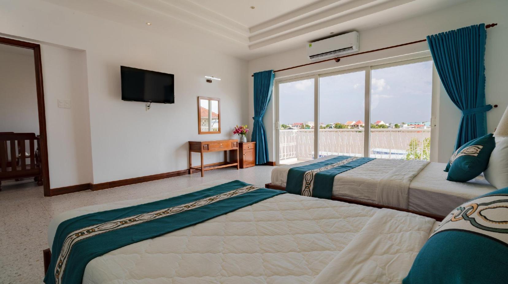 Deluxe Riverside Triple Room - Bed