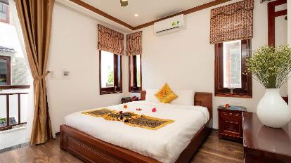 Deluxe Double Room with Balcony - Bedroom