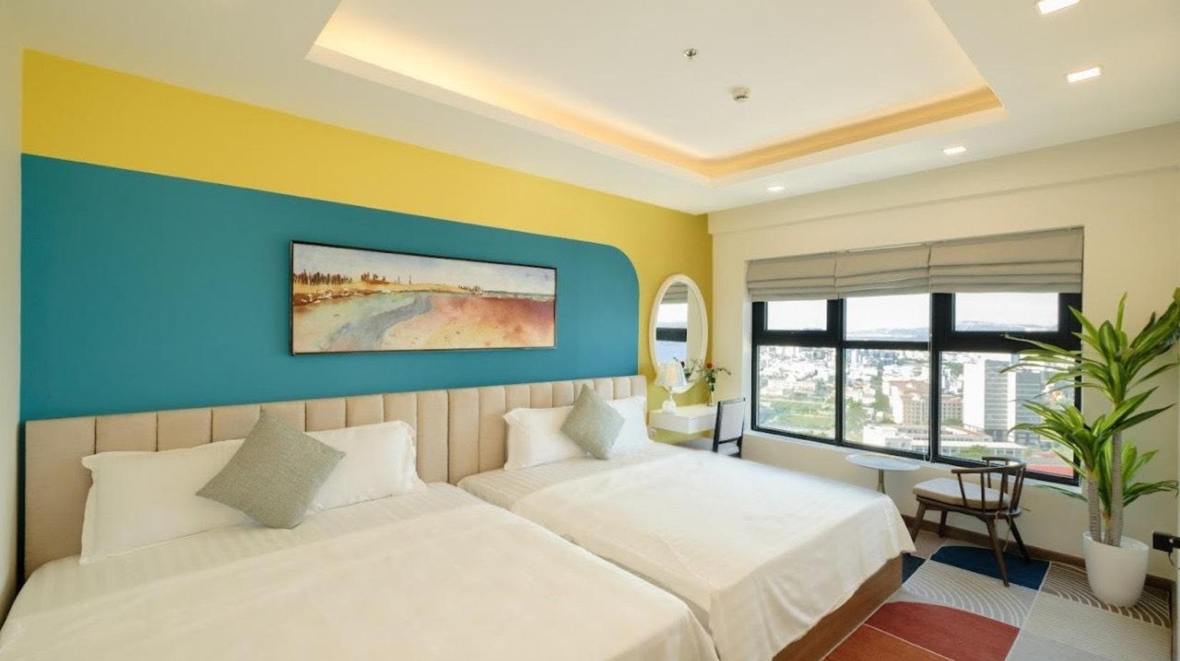 Three-Bedroom Ocean View Apartment - Bed