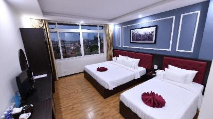 Triple Room With City View - Bed