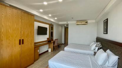 Premier Triple Room - Bedroom