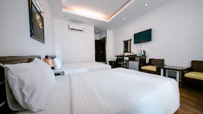 Deluxe City View Triple Room - Bedroom