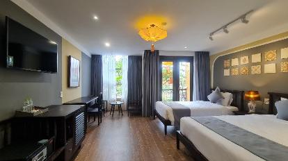 Deluxe Triple Room with balcony - Guestroom