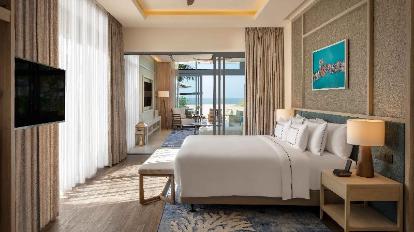 The Level 1 Bedroom Oceanfront Villa - Bed