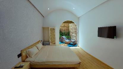 Double Room with Patio - Bed