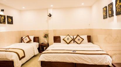 Deluxe Triple Room - Bed