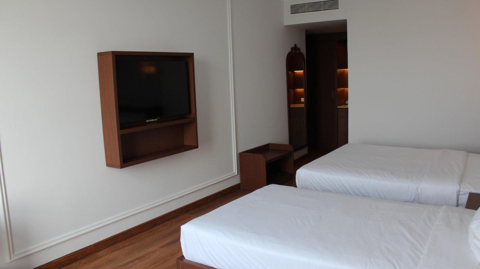 Triple Deluxe Room - Bed