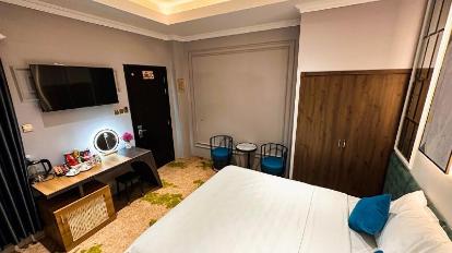 Deluxe Double Room with Balcony - Bed