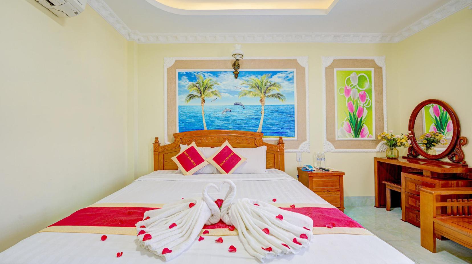 Deluxe Sea View King Room - Bed