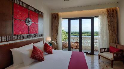 Grand Deluxe Pool and River View Double Room - Bed