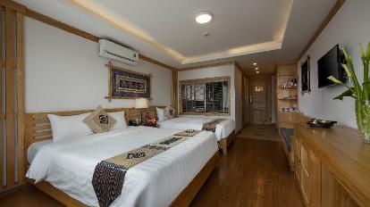 Deluxe Triple Room - Bed