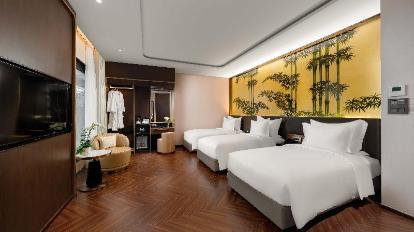 Executive Premier Triple Room - Bedroom