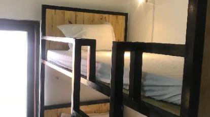 A Bed in All-Male Dormitory Bedroom - Bed