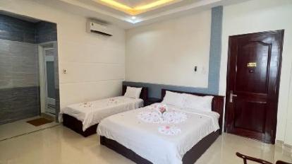 Deluxe Triple Room - Bed