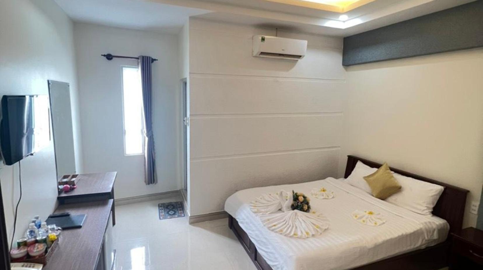 Deluxe Room with View - Bed